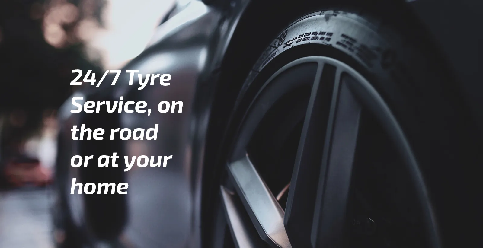 Close-up of a car wheel and tyre