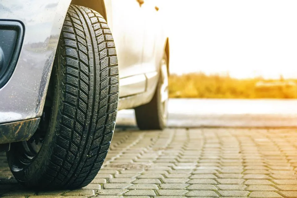 A vehicle tyre beside a roadside